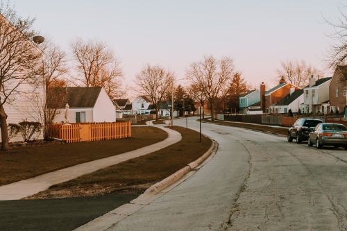 photo of a road in a neighborhood