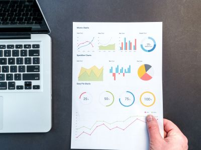 a data chart next to a laptop