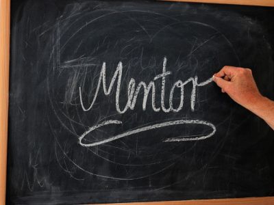 Image of mentor written on a chalkboard.