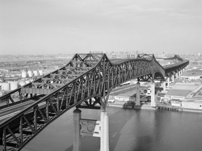Photo of bridge above water.
