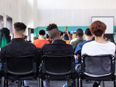 a group of diverse students in a classroom