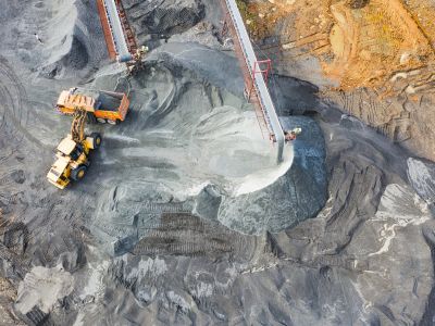 an excavator in a large work site