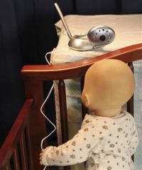 Image of baby and baby monitor